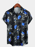 Chemise d'été décontractée pour homme bleu floral à manches courtes avec boutons pour des vacances à la plage