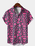 Chemise d'été pour homme avec imprimé de crâne rose et marguerites, à boutons, à manches courtes pour les vacances