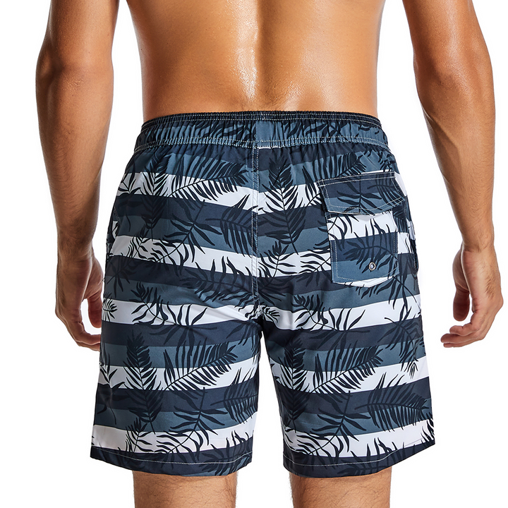 Feuilles tropicales et shorts de plage rayés à séchage rapide pour hommes