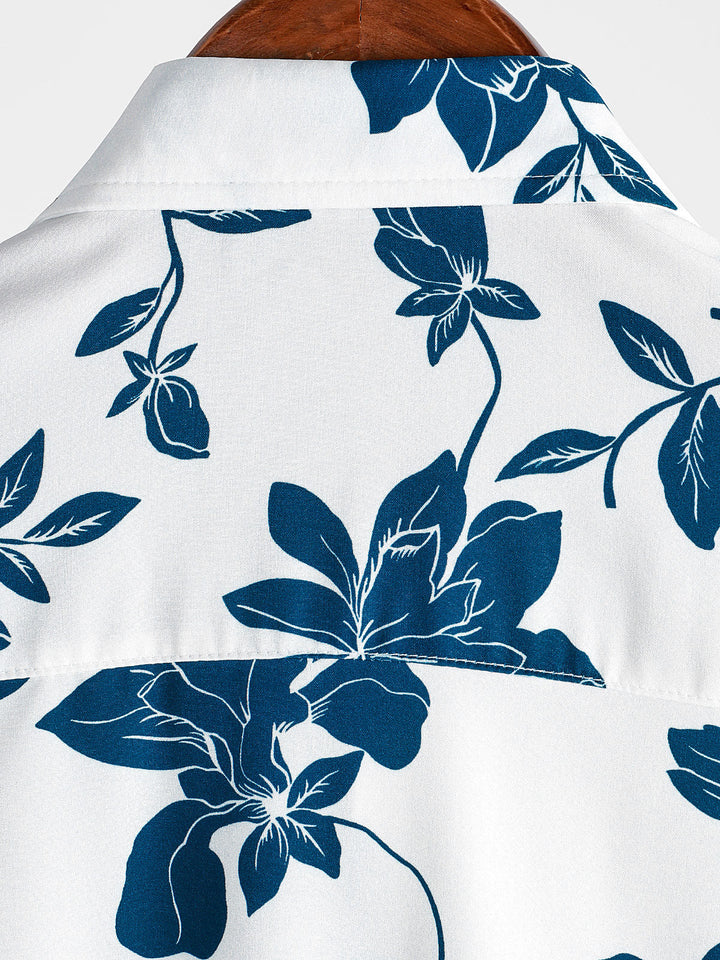 Chemise à manches courtes boutonnée bleue à fleurs pour hommes
