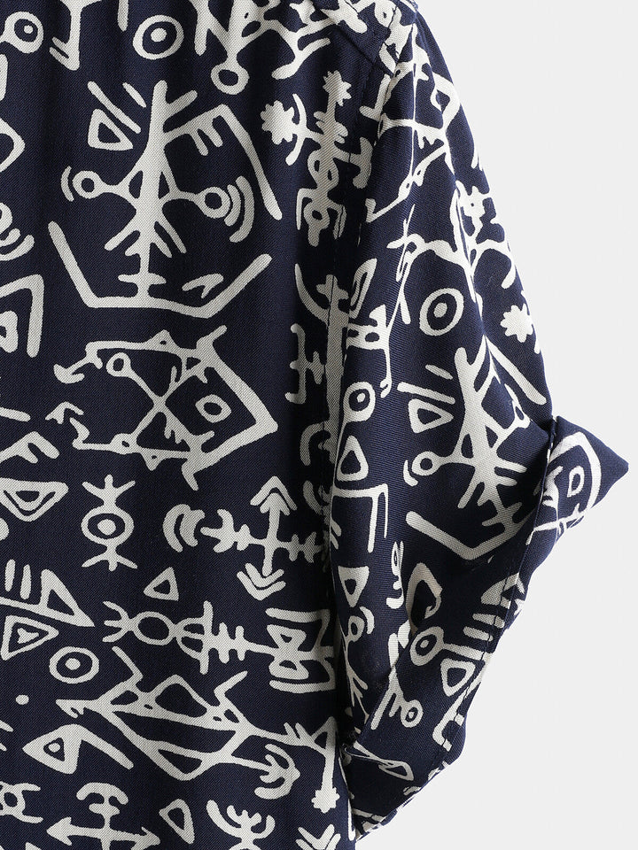 Chemise homme manches courtes imprimé tribal symboles bleu marine en rayon