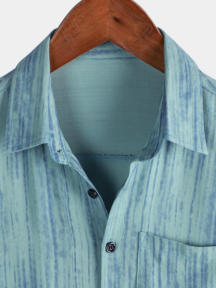 Chemise rayée bleue respirante à manches courtes et poches pour homme