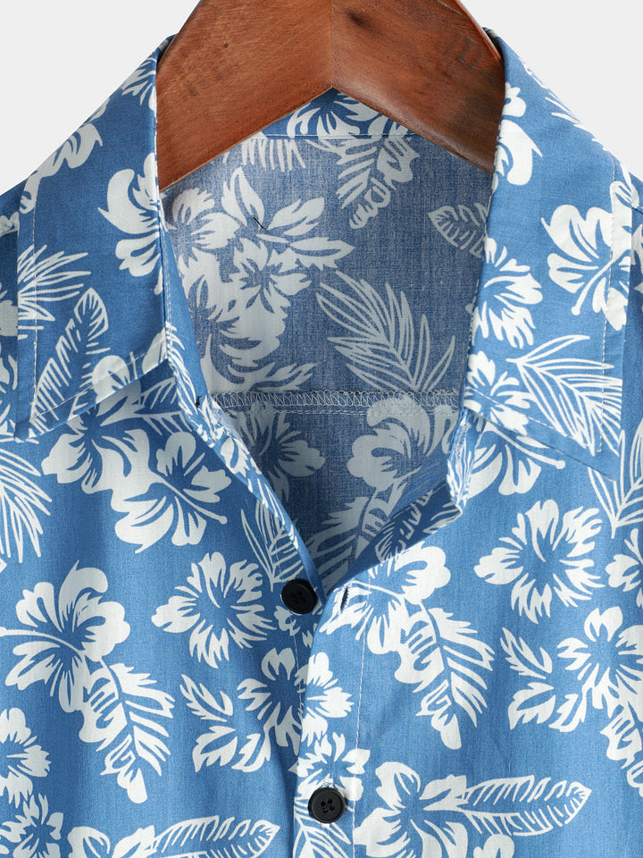 Chemise de plage boutonnée à manches courtes en coton avec feuilles de plantes tropicales bleues pour hommes Aloha Resort