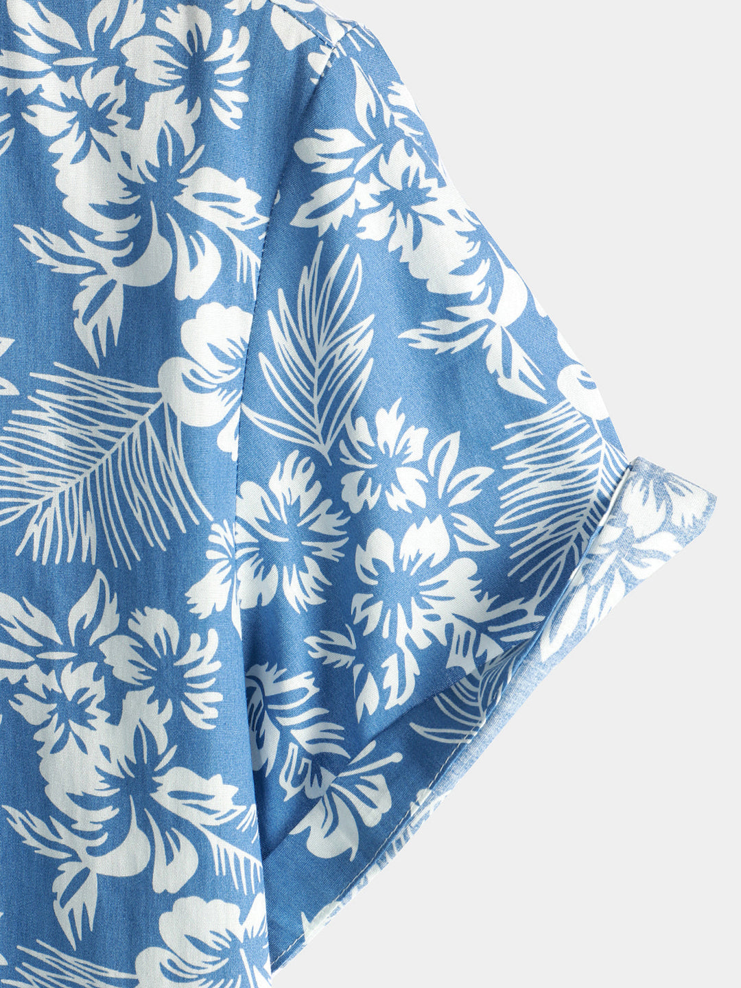 Chemise de plage boutonnée à manches courtes en coton avec feuilles de plantes tropicales bleues pour hommes Aloha Resort