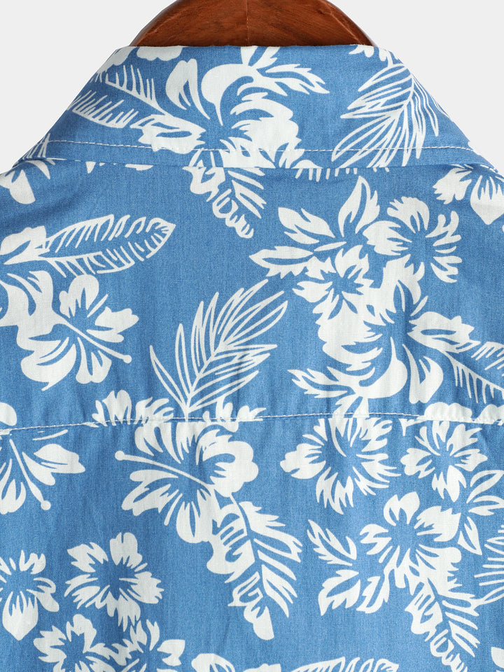 Chemise de plage boutonnée à manches courtes en coton avec feuilles de plantes tropicales bleues pour hommes Aloha Resort