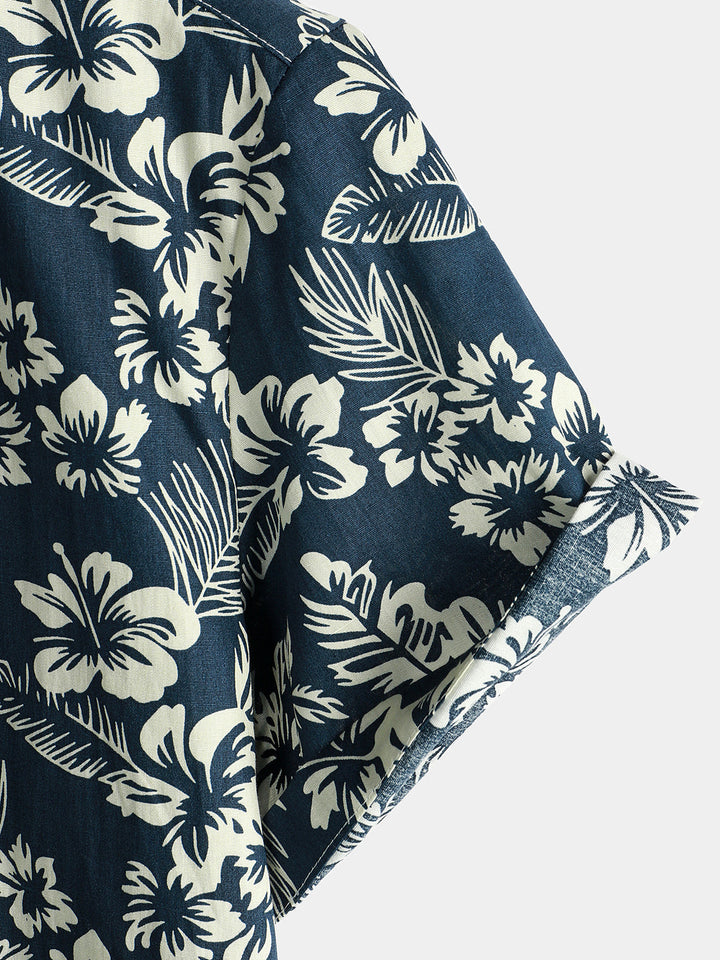 Chemise de plage boutonnée à manches courtes en coton avec feuilles de plantes tropicales bleues pour hommes Aloha Resort