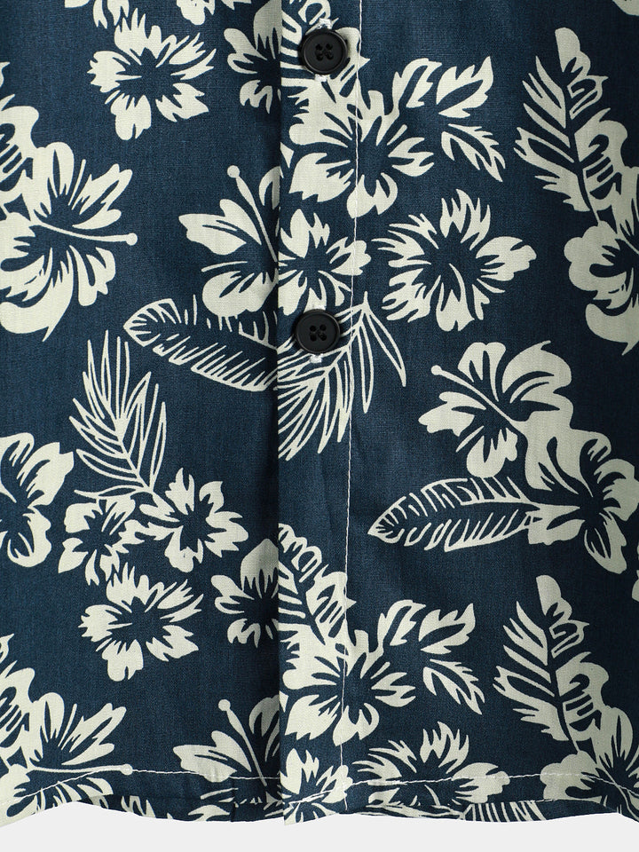 Chemise de plage boutonnée à manches courtes en coton avec feuilles de plantes tropicales bleues pour hommes Aloha Resort