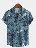Chemise de vacances à manches courtes bleue à imprimé floral pour homme
