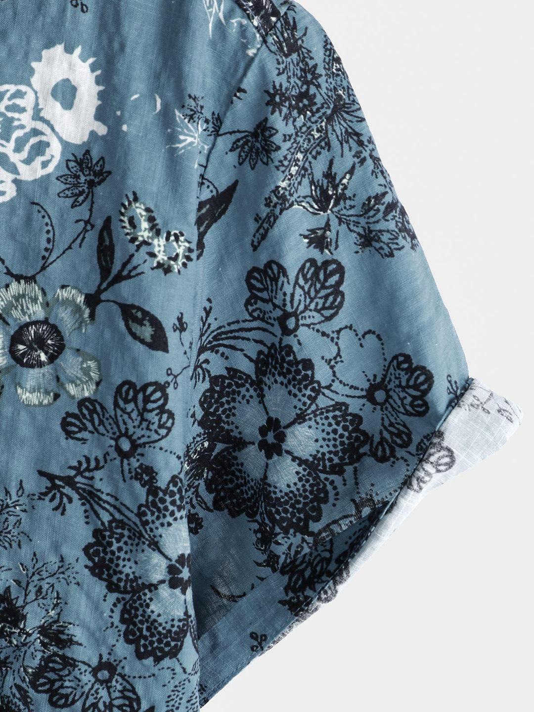 Chemise de vacances à manches courtes bleue à imprimé floral pour homme