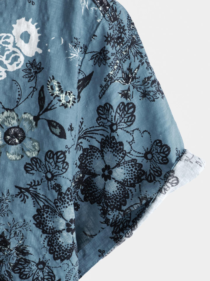 Chemise de vacances à manches courtes bleue à imprimé floral pour homme