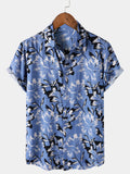 Chemise Homme Tropicale Bleue à Fleurs Manches Courtes Boutonnée