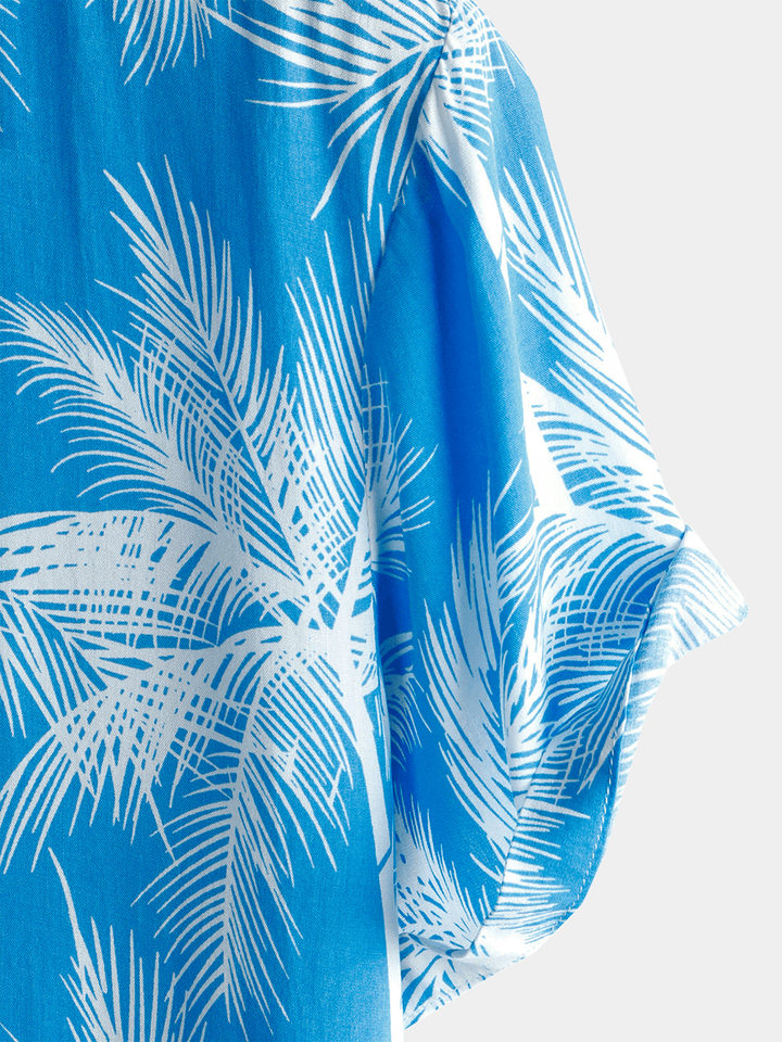Chemise homme manches courtes imprimé tropical bleu style plage