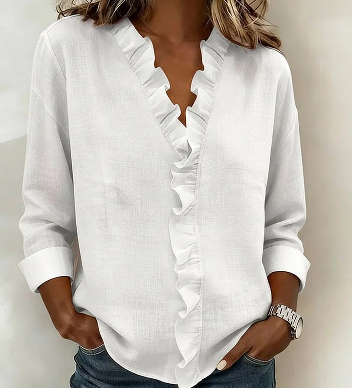 Anora | Blouse à volants et col en V
