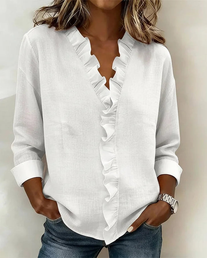 Anora | Blouse à volants et col en V