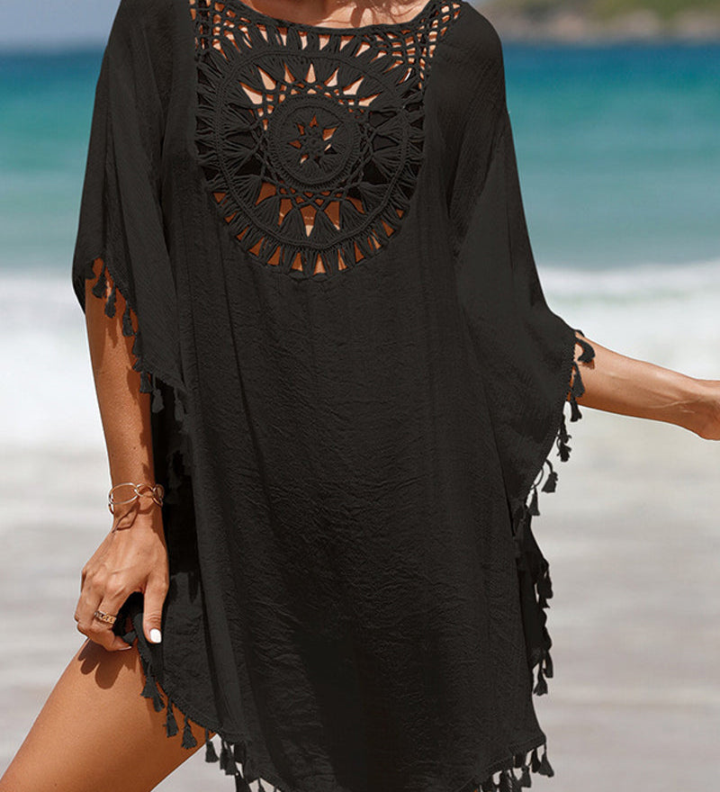 Couverture de plage avec pompons