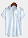 Chemise d'été décontractée à manches courtes et poches pour homme, couleur unie