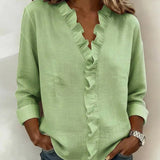 Anora | Blouse à volants et col en V