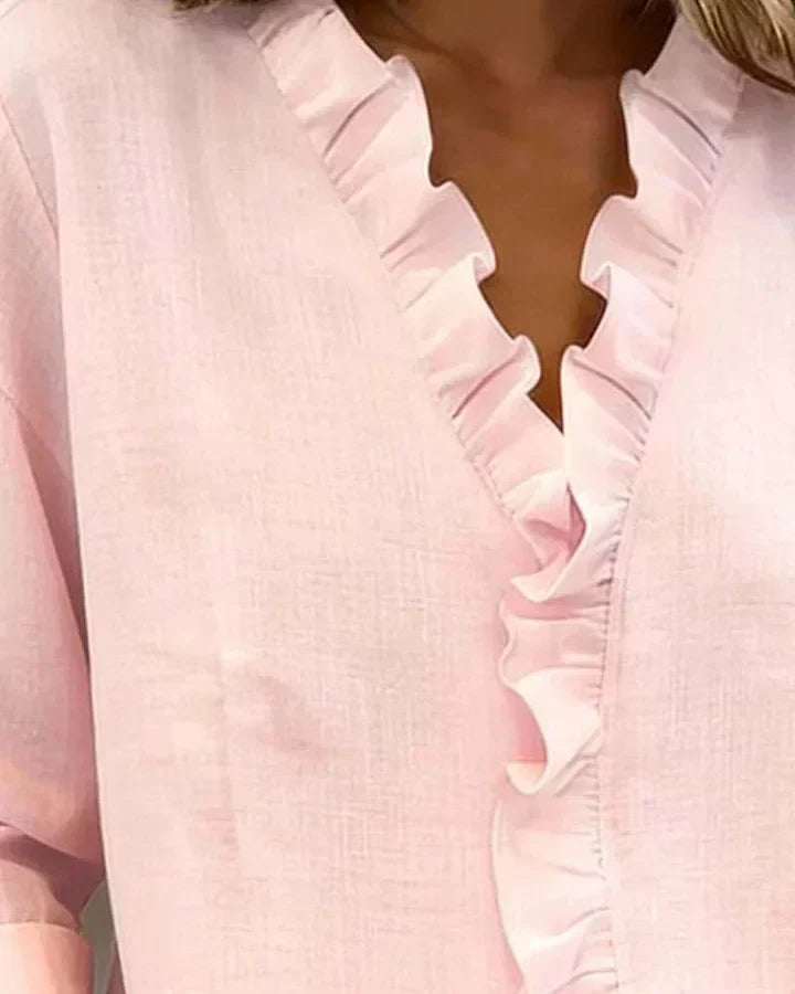 Anora | Blouse à volants et col en V