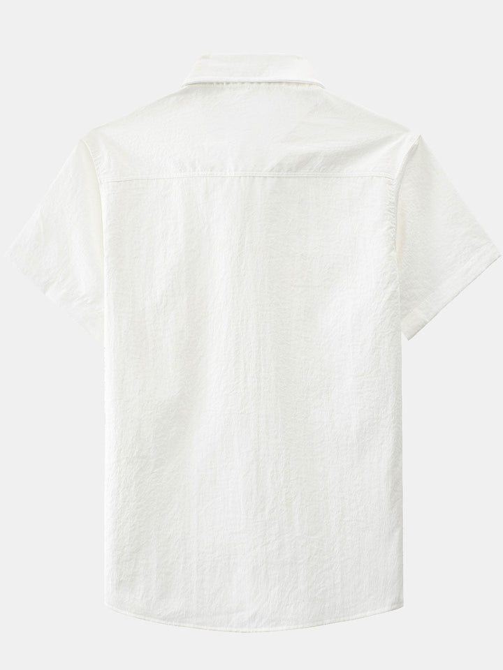 Chemise boutonnée décontractée à poches solides pour homme