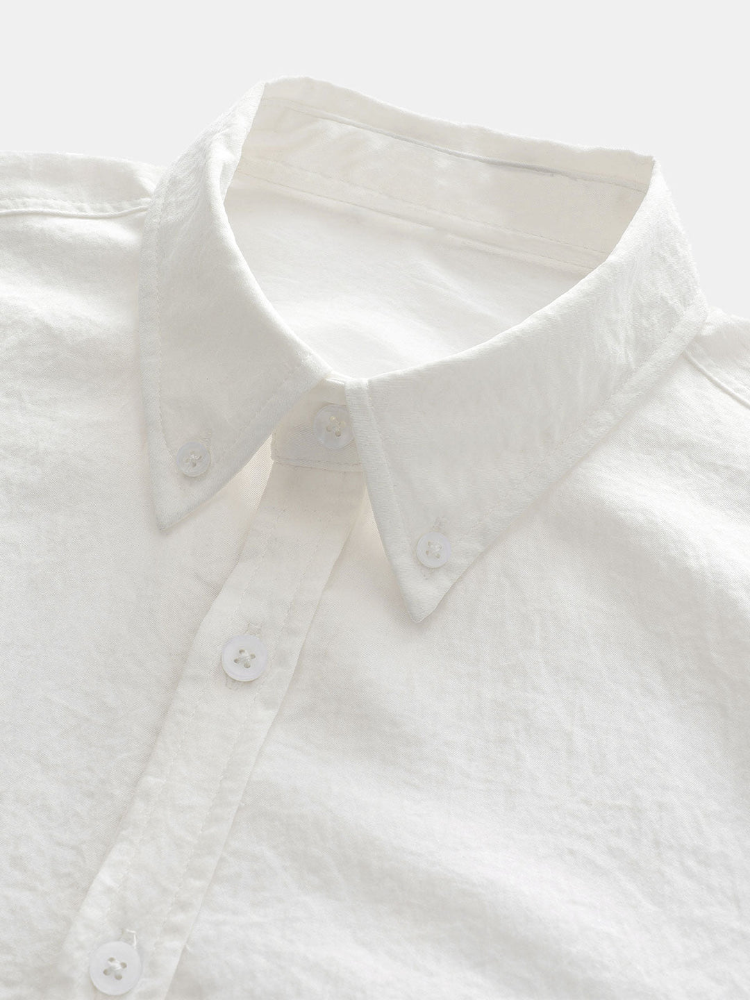 Chemise boutonnée décontractée à poches solides pour homme