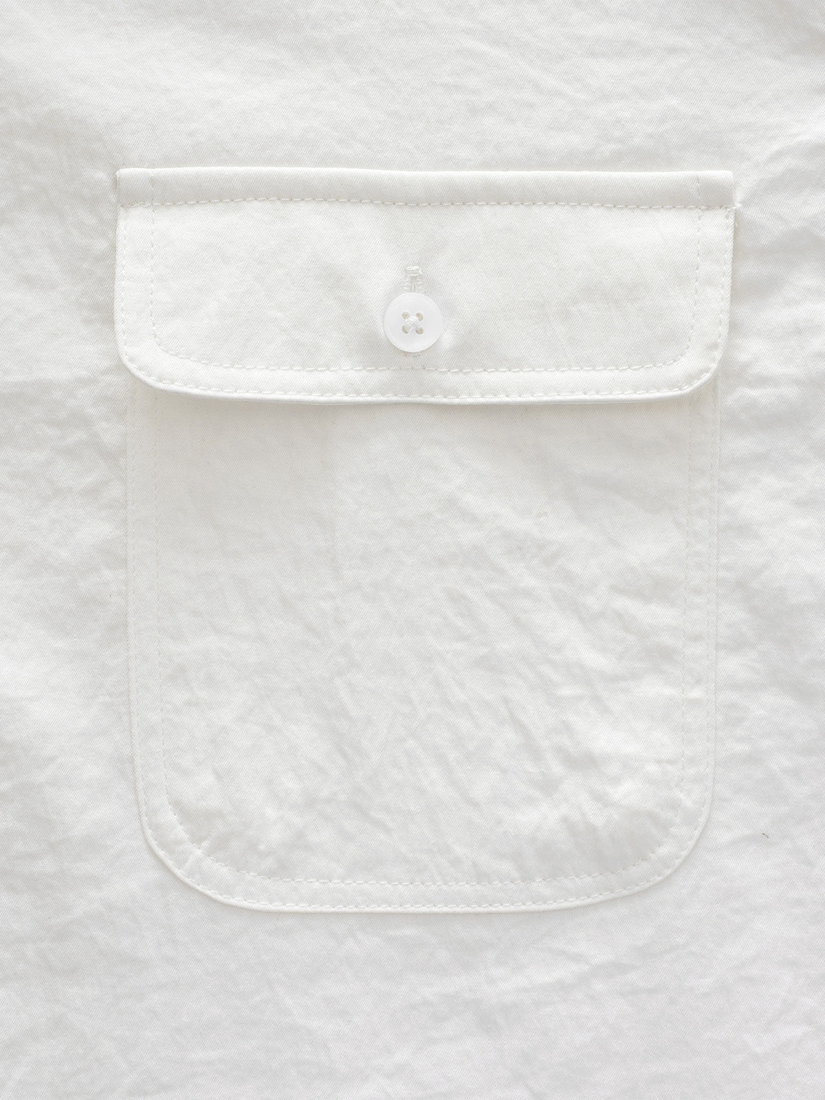 Chemise boutonnée décontractée à poches solides pour homme