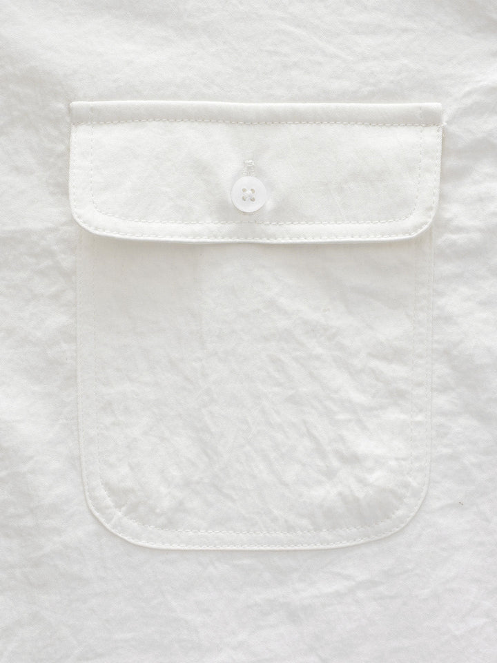 Chemise boutonnée décontractée à poches solides pour homme