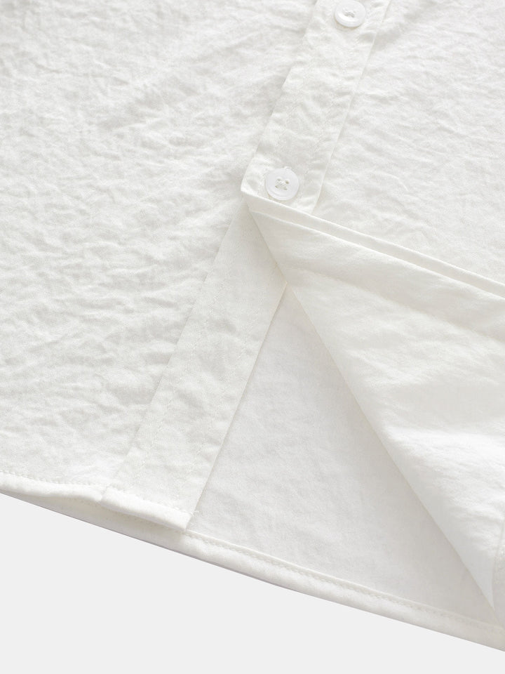 Chemise boutonnée décontractée à poches solides pour homme