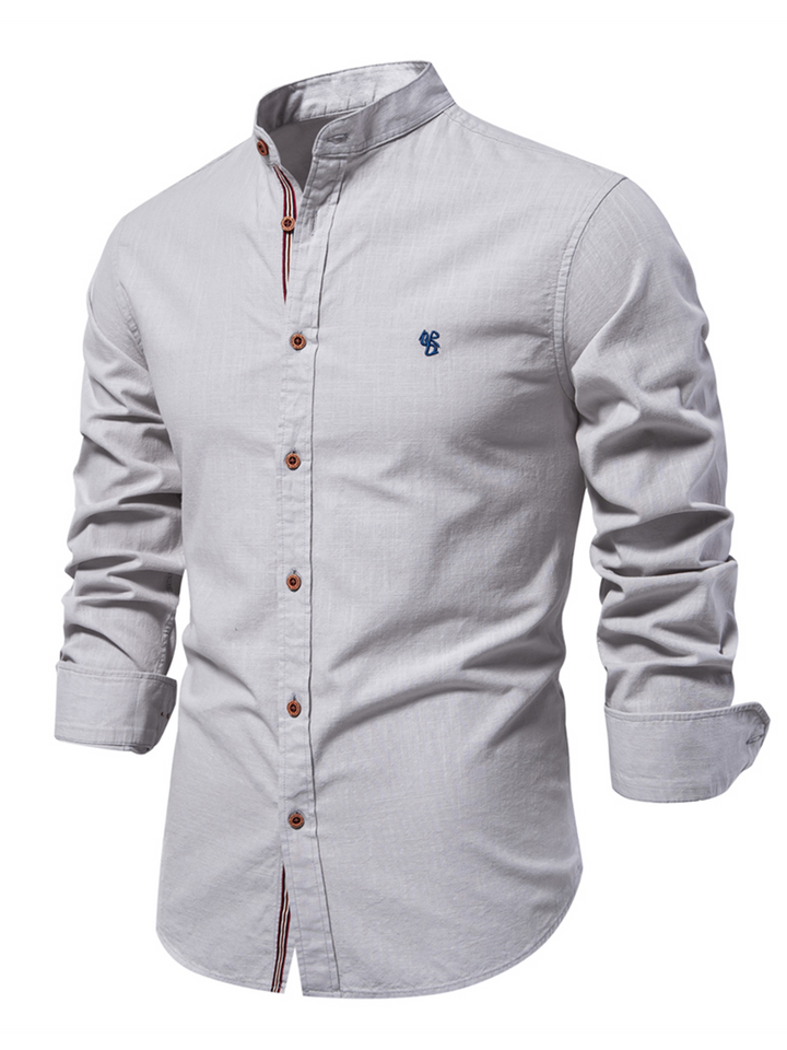 Chemise boutonnée à manches longues 100% coton de couleur unie pour hommes