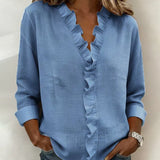 Anora | Blouse à volants et col en V